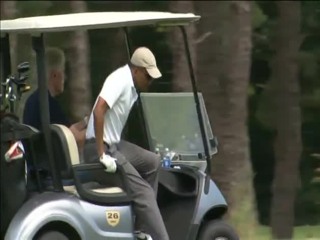 Obama y Clinton, compañeros de golf