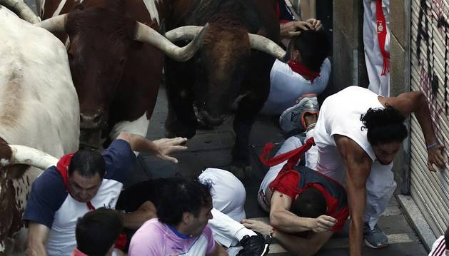 Fotos del tercer encierro de San Fermín 2018