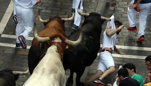 Fotos del séptimo encierro de San Fermín 2019